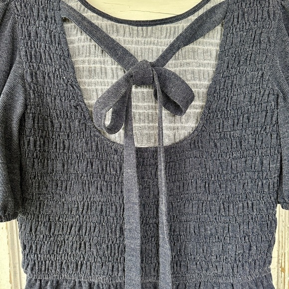 LISTICLE, DENIM ROMPER. SMOCKED TOP WITH PUFF SLEEVES. SEMI-OPEN BACK. SIZE S - Picture 7 of 10